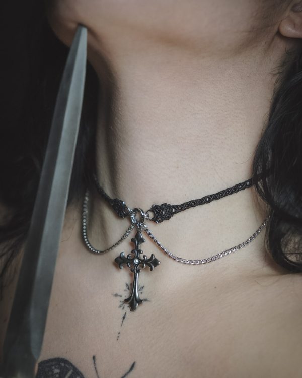 brigid necklace with a dagger